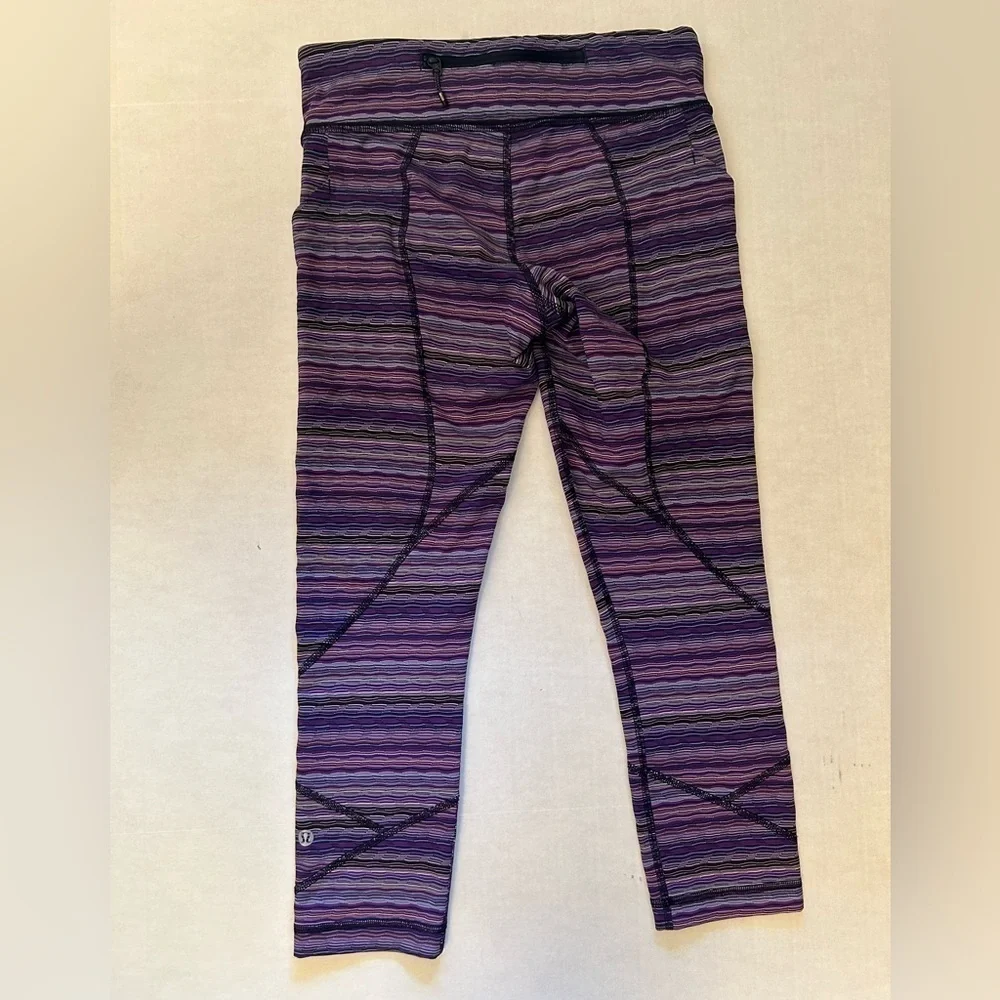 Lululemon striped purple legging w/back zip pocket & 2‎ side pockets Sz-6. Z19